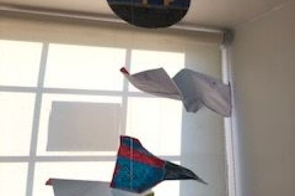 Leo's creative paper plane mobile