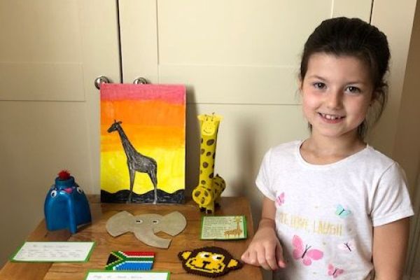 Ellie looks very proud of her fantastic African presentation.